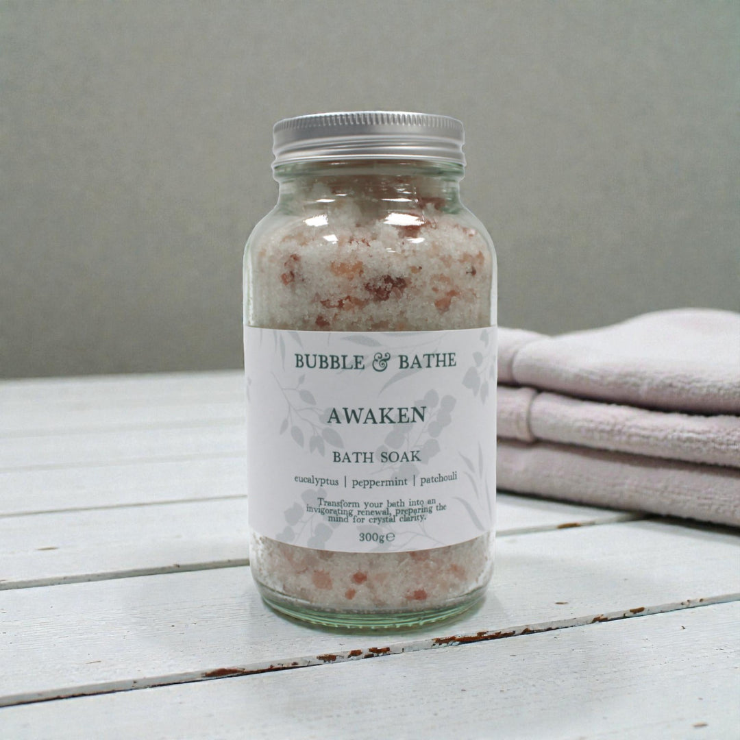 Bubble & Bathe Awaken Bath Soak jar containing Eucalyptus, Peppermint and Himalayan pink salts for muscle recovery and energy.