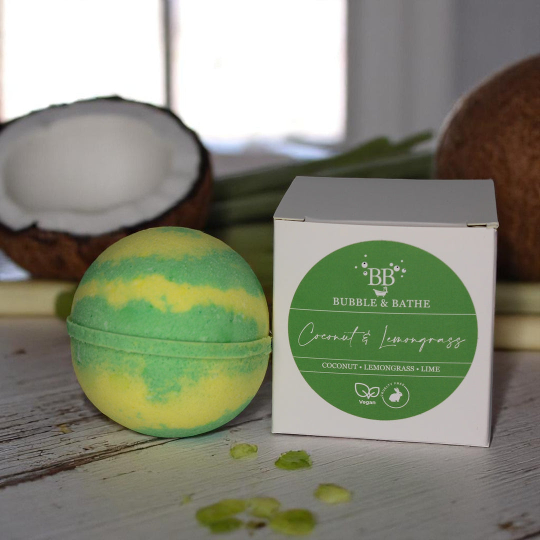 Coconut & Lemongrass jumbo bath bomb by Bubble & Bathe, handmade in North Devon, yellow bath bomb with tropical coconut, lime, and ginger scent, vegan and plastic-free


