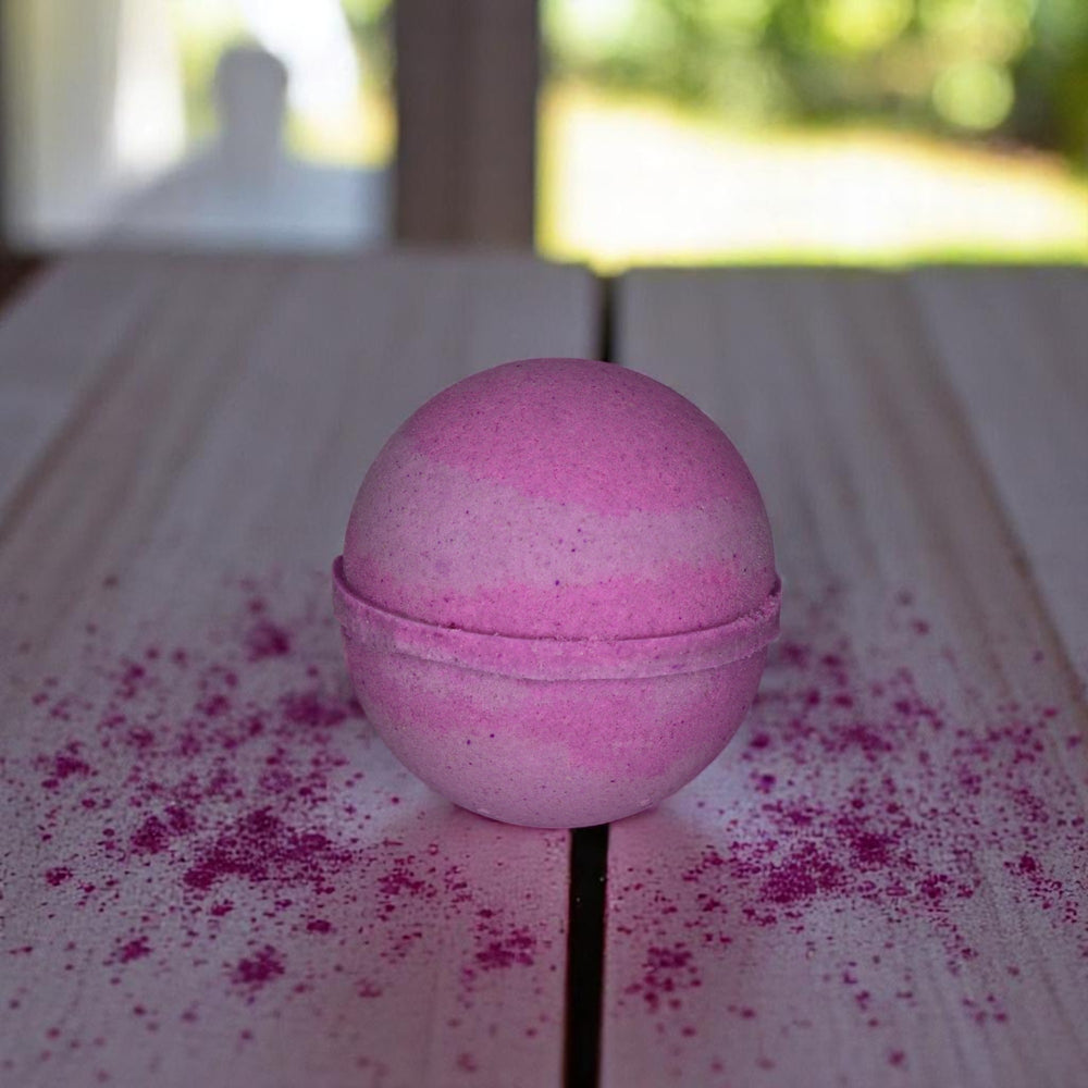 Enchanted Fairy jumbo bath bomb by Bubble & Bathe, handmade in North Devon, pink and purple bath bomb with fruity floral scent, vegan and plastic-free

