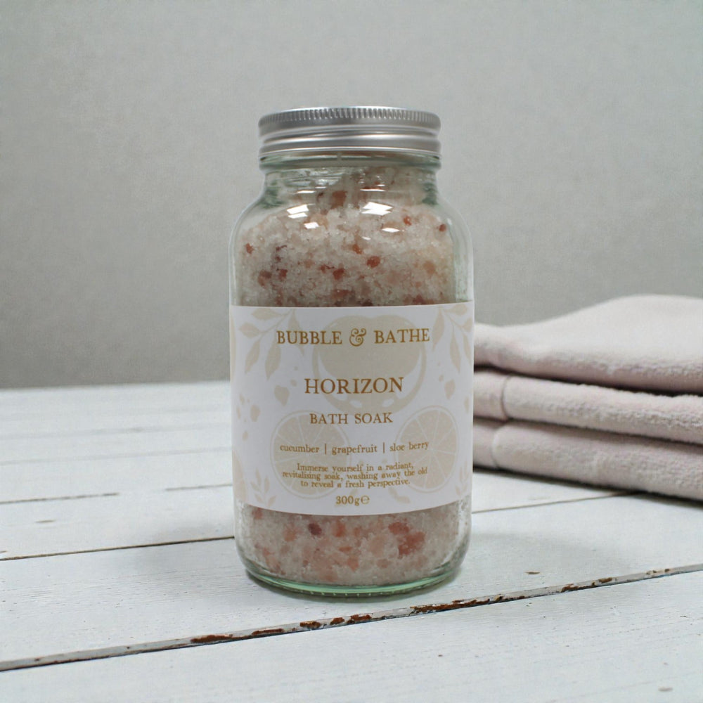 Bubble & Bathe Horizon Bath Soak jar infused with zesty Grapefruit and Cucumber sea salts for an uplifting citrus bath.