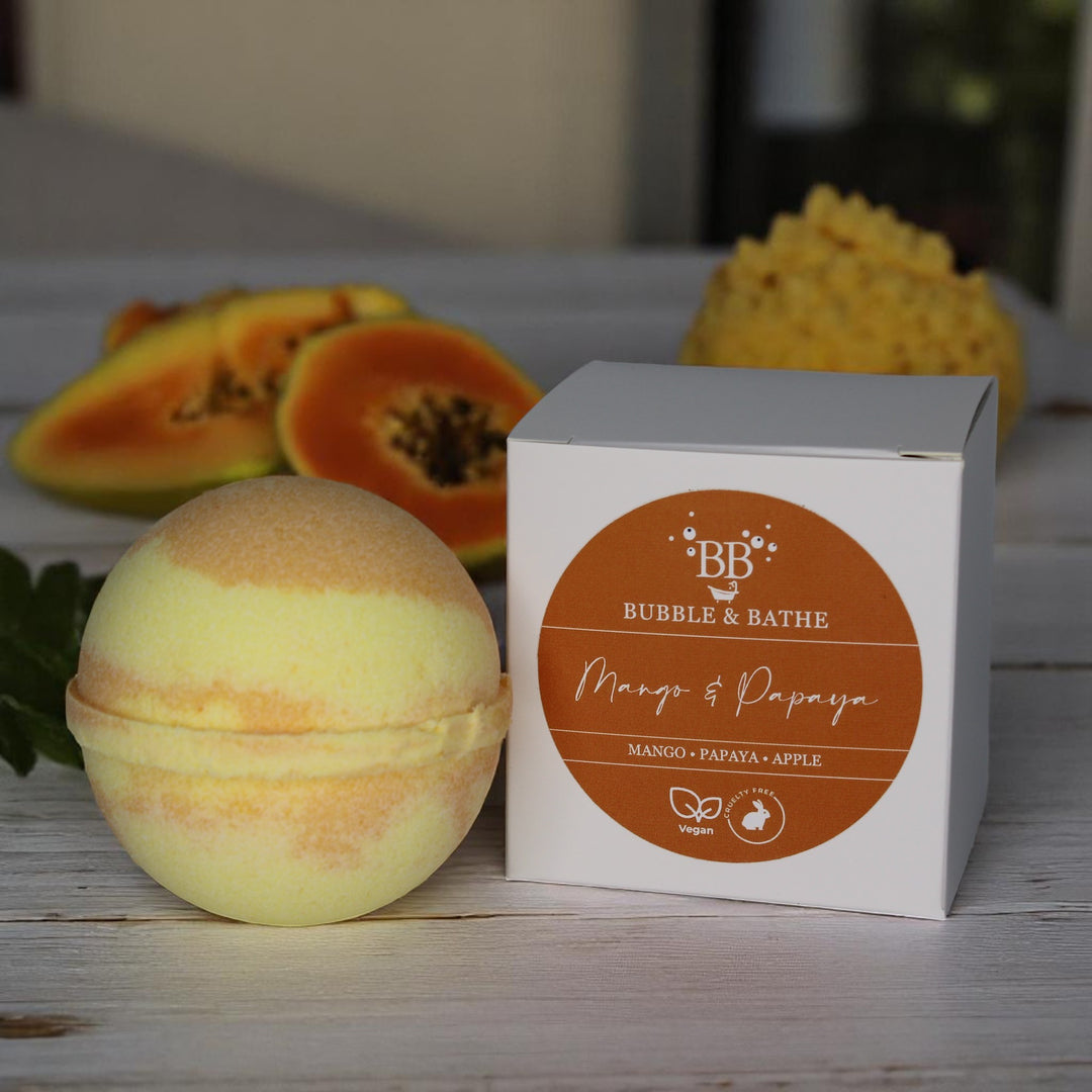 Mango & Papaya jumbo bath bomb by Bubble & Bathe, handmade in North Devon, yellow and orange bath bomb with sweet mango and papaya scent, vegan and plastic-free