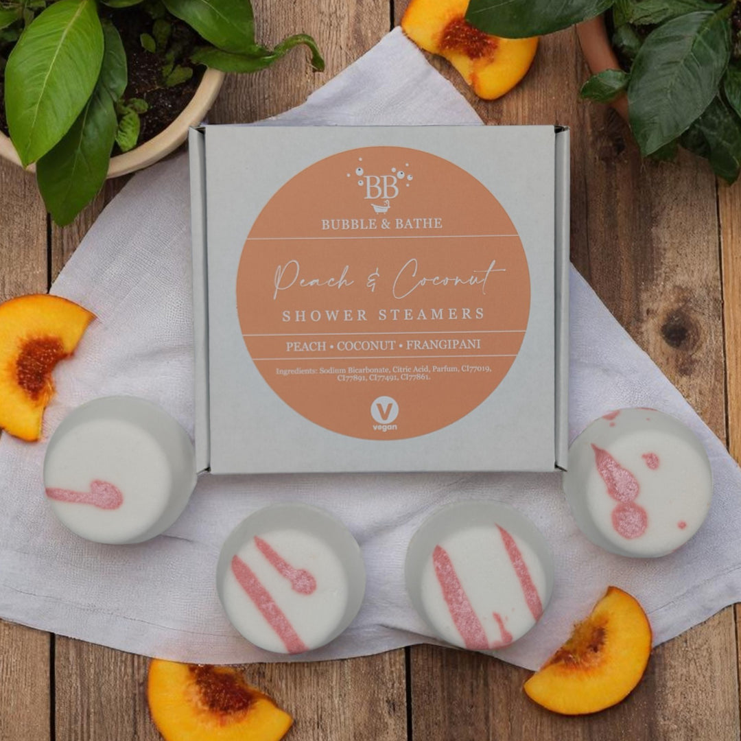 Peach & Coconut vegan shower steamers by Bubble & Bathe, handmade in North Devon, peach, coconut milk, and frangipani scent, box of 4, plastic-free packaging