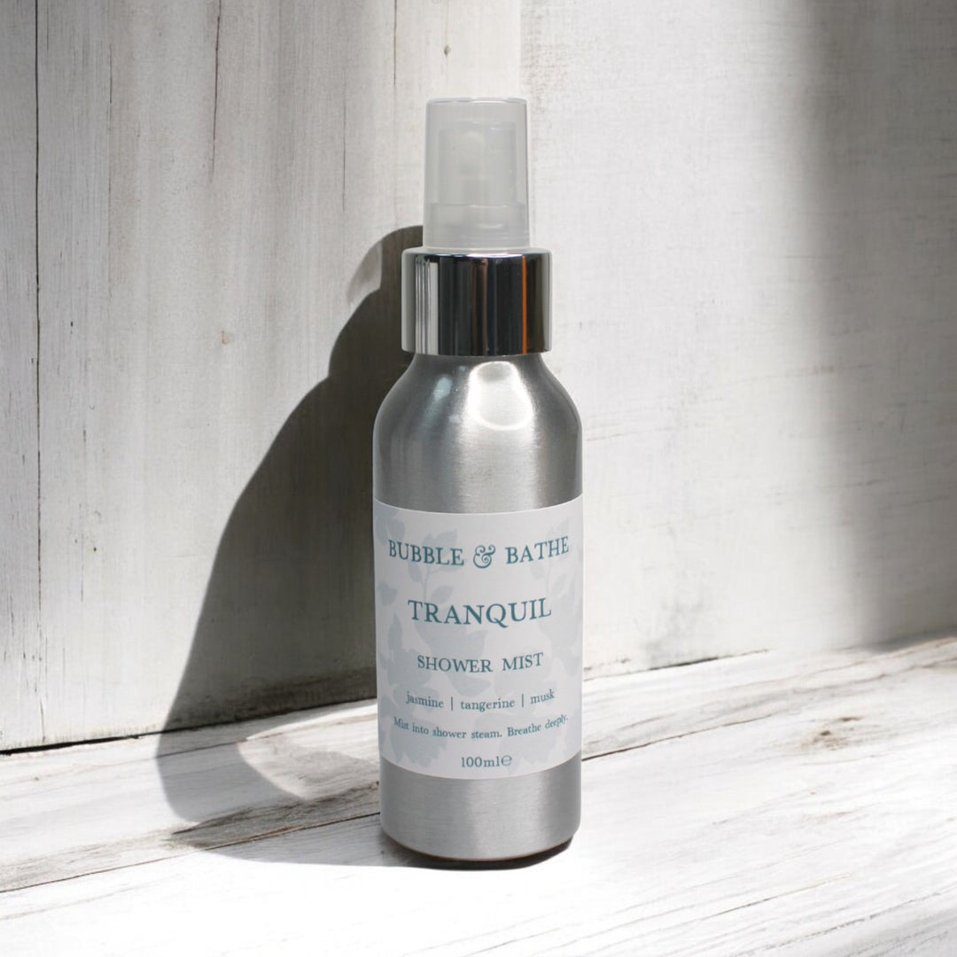 Bubble & Bathe Tranquil Shower Mist spray with the clean, comforting scent of Fresh Cotton and Cashmere Woods.